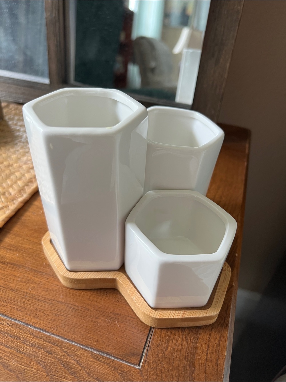White Hexagonal Ceramic Vases on Bamboo tray